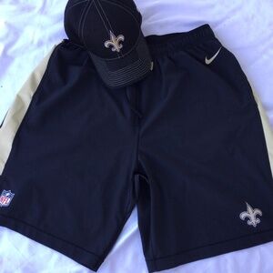 Men’s Nike NFL Light Weight Black & Gold Polyester Shorts, XXL and Saints Hat